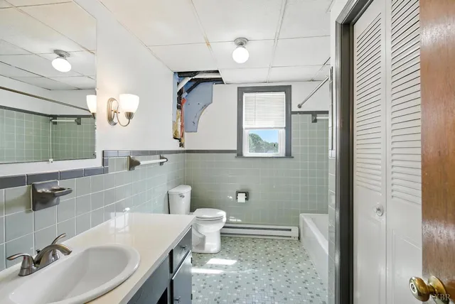 a view of empty room with stairs