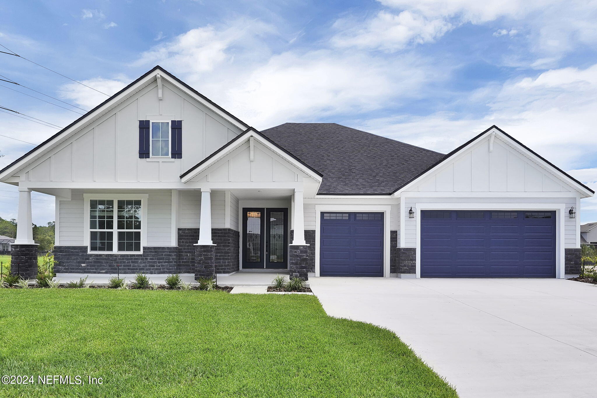 116 Greylock Lane St. Augustine, FL 32092 - Photo 1 of 50 a front view of a house with a yard and garage