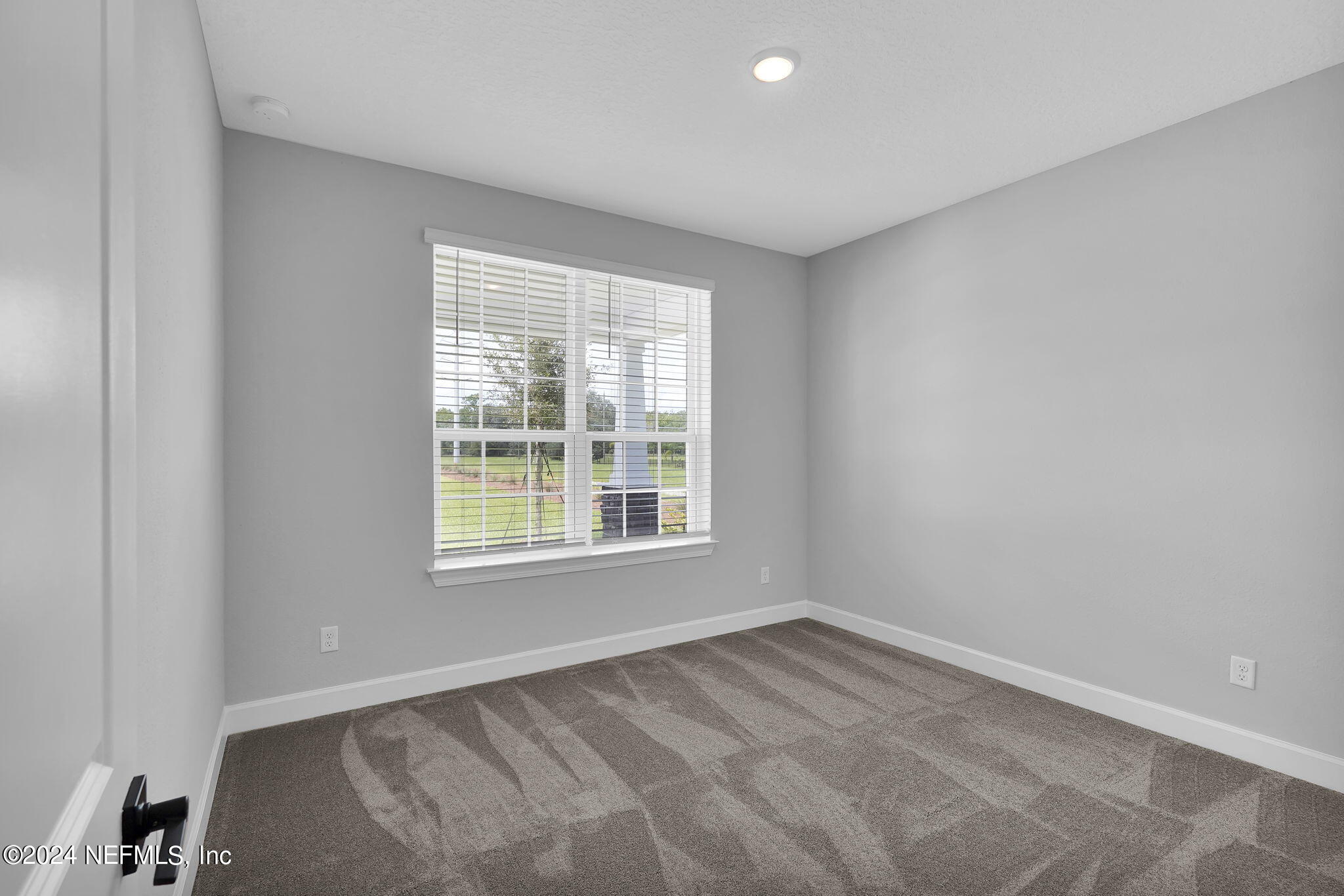 116 Greylock Lane St. Augustine, FL 32092 - Photo 11 of 50 an empty room with a window