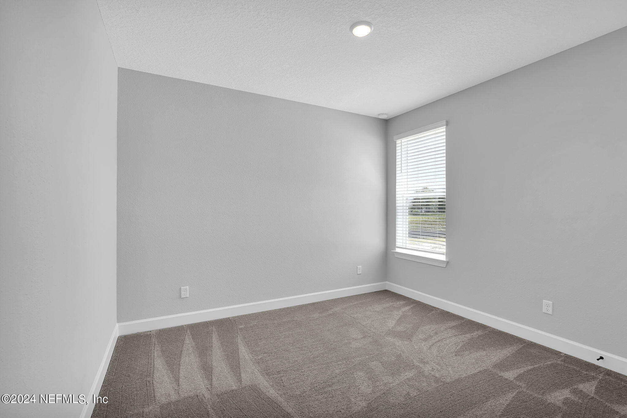 116 Greylock Lane St. Augustine, FL 32092 - Photo 13 of 50 an empty room with a window