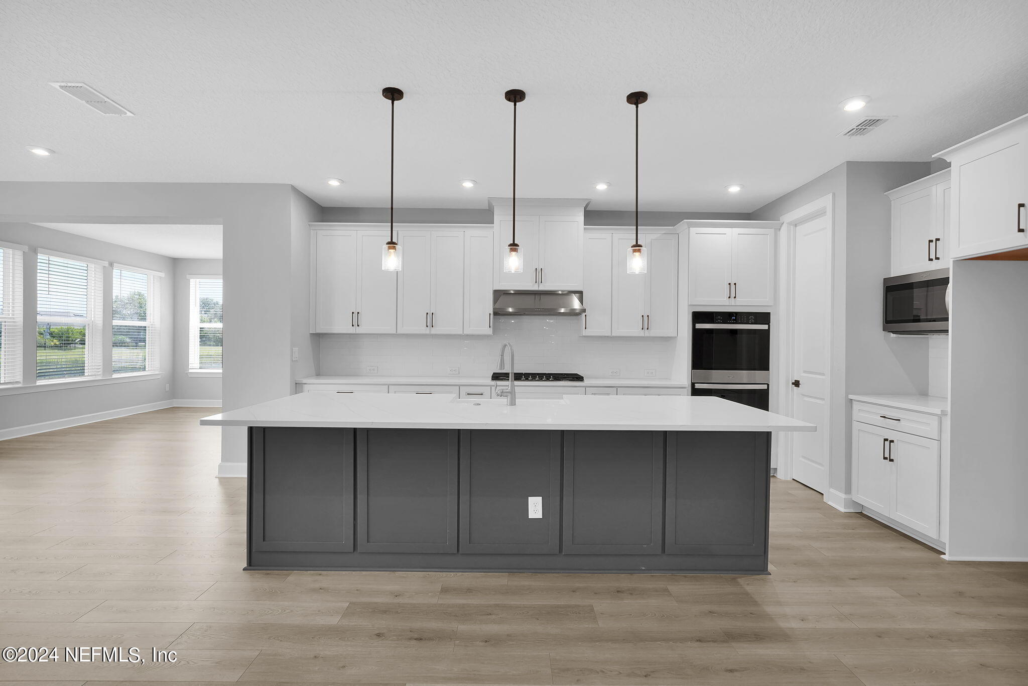 116 Greylock Lane St. Augustine, FL 32092 - Photo 25 of 50 a kitchen with stainless steel appliances sink refrigerator and window