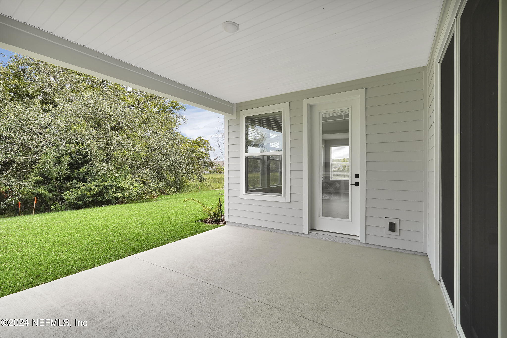 116 Greylock Lane St. Augustine, FL 32092 - Photo 3 of 50 a view of a porch with a yard