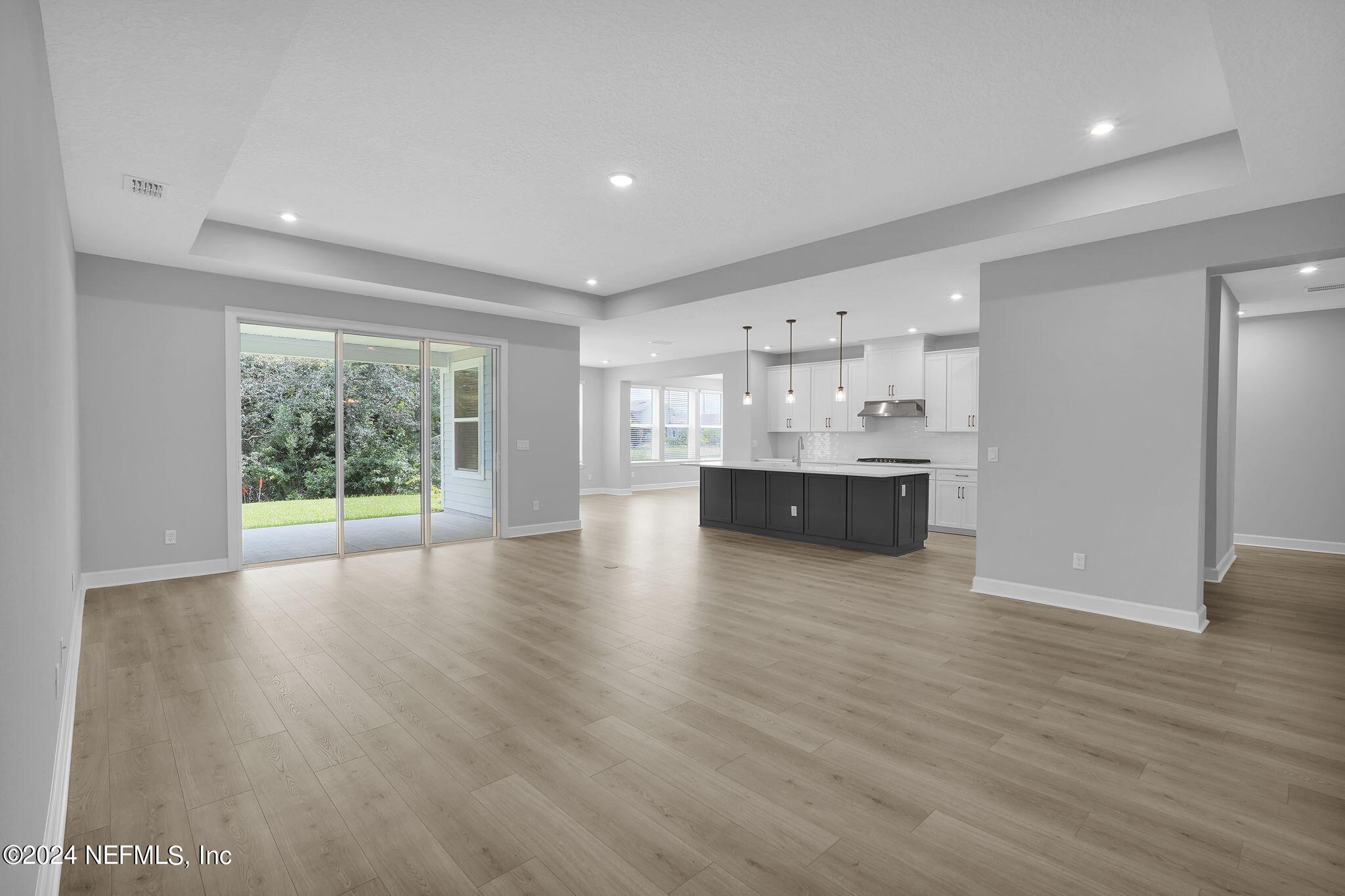 116 Greylock Lane St. Augustine, FL 32092 - Photo 34 of 50 a view of kitchen and hall with wooden floor
