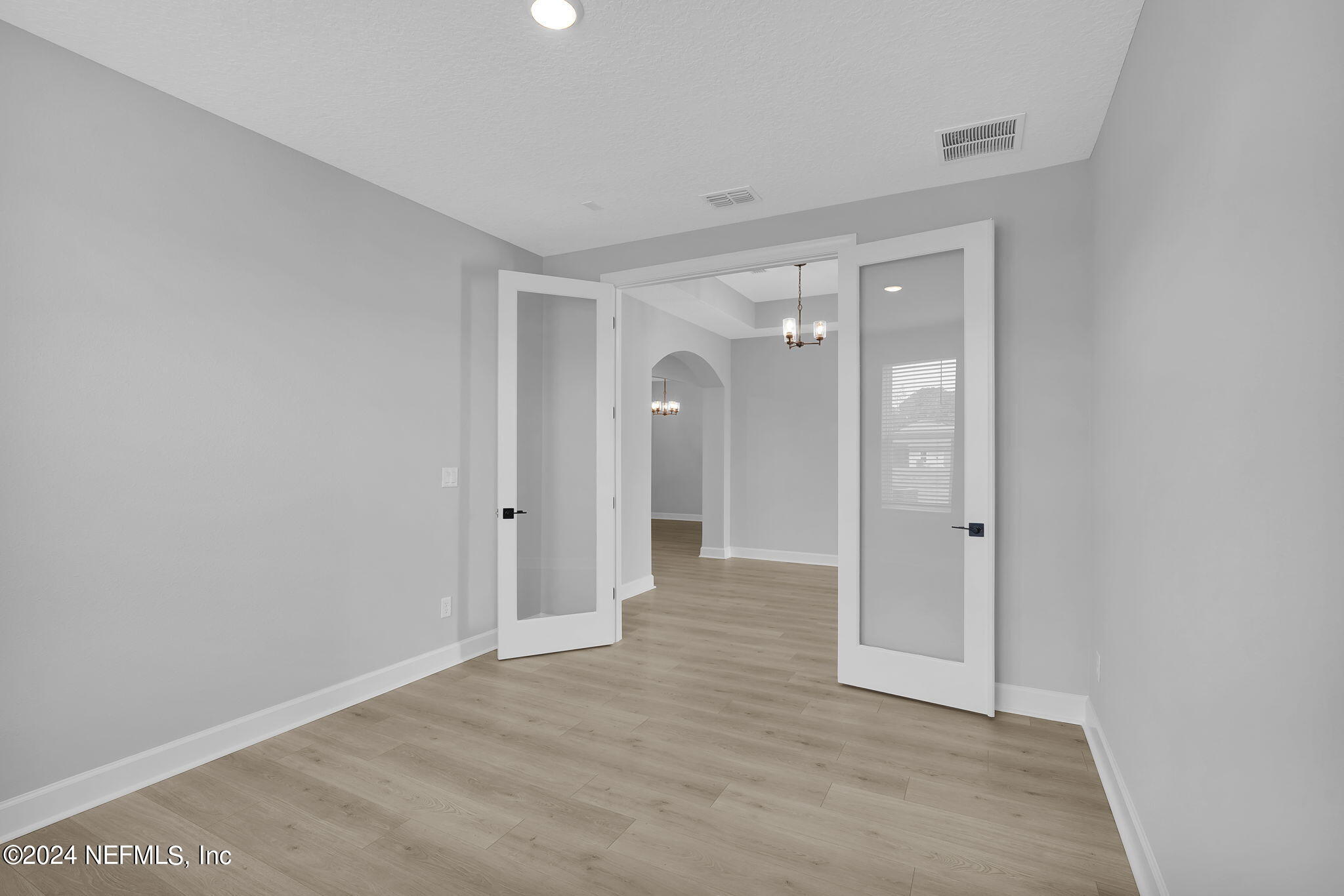 116 Greylock Lane St. Augustine, FL 32092 - Photo 46 of 50 a view of a hallway with wooden shelves