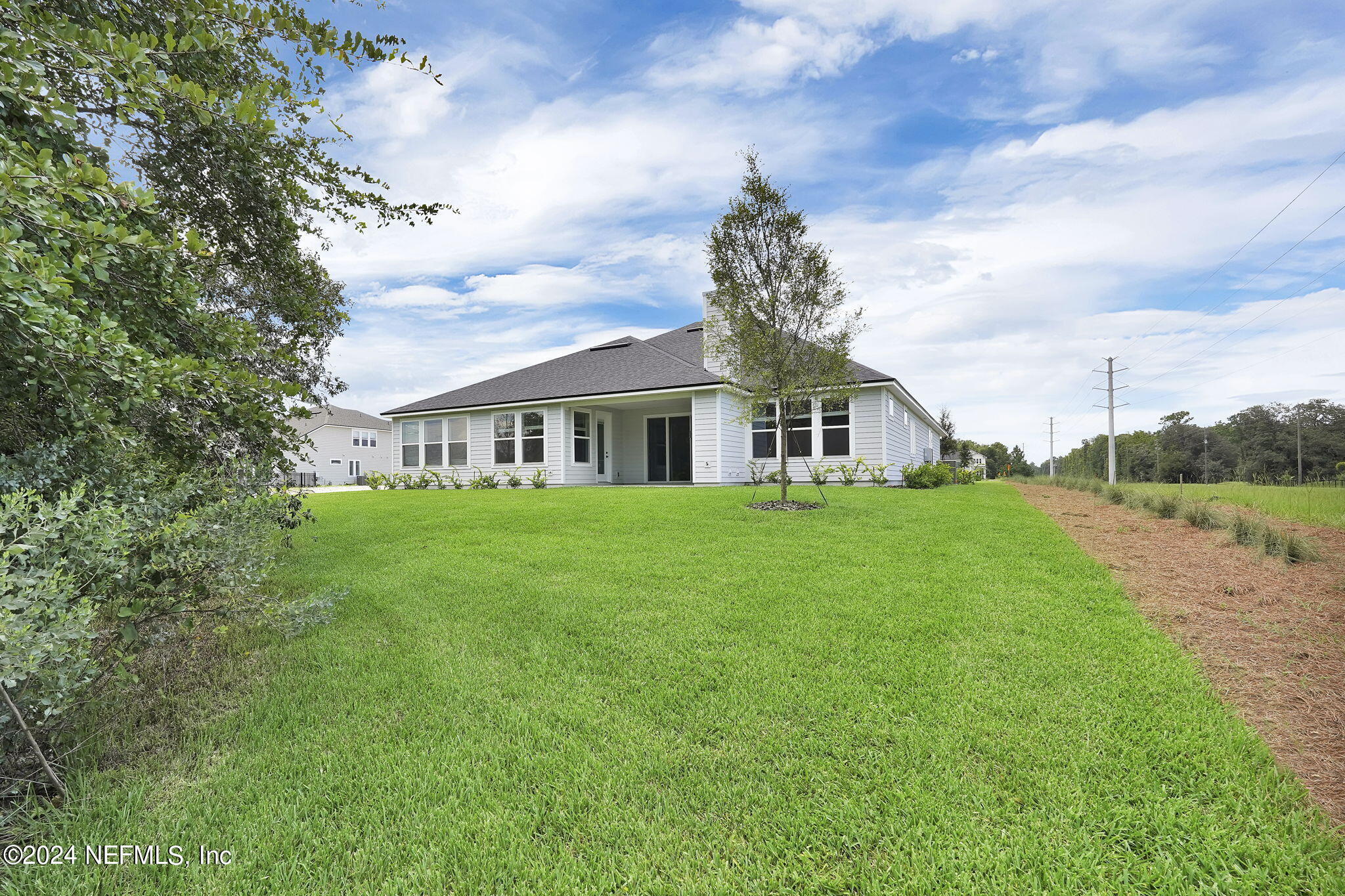 116 Greylock Lane St. Augustine, FL 32092 - Photo 6 of 50 a front view of a house with garden