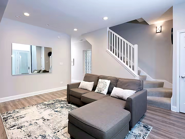 1427 North Mohawk Street Chicago, IL 60610 - Photo 14 of 54 a living room with furniture and wooden floor
