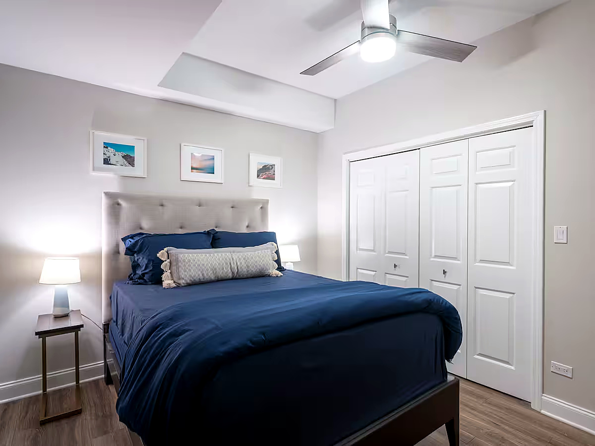 1427 North Mohawk Street Chicago, IL 60610 - Photo 15 of 54 a bedroom with a bed and a painting on the wall
