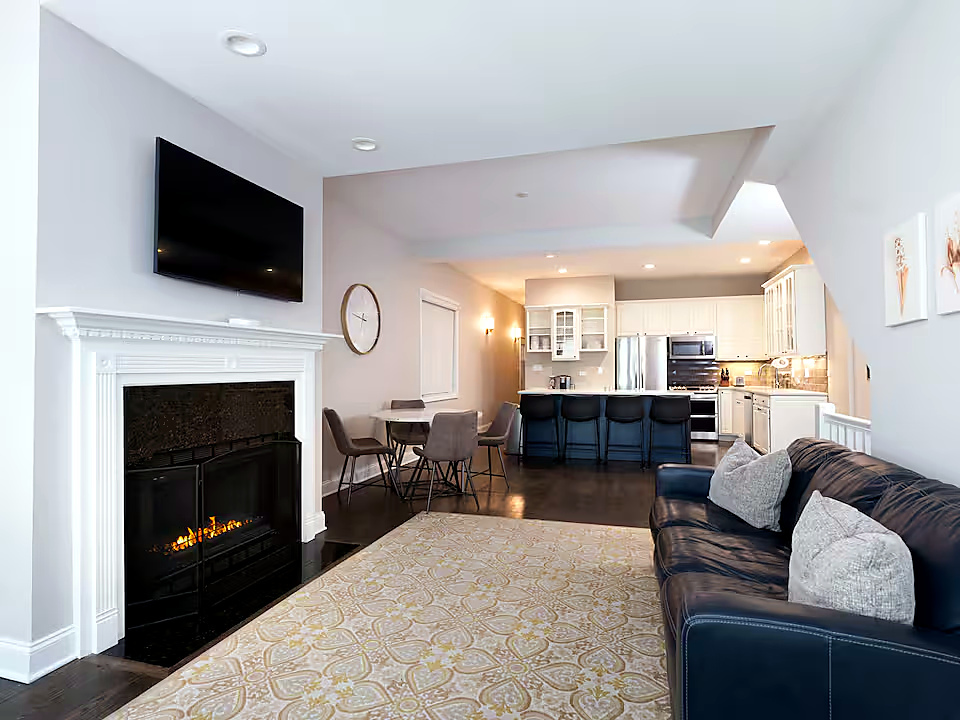 1427 North Mohawk Street Chicago, IL 60610 - Photo 2 of 54 a living room with furniture a fireplace and a flat screen tv