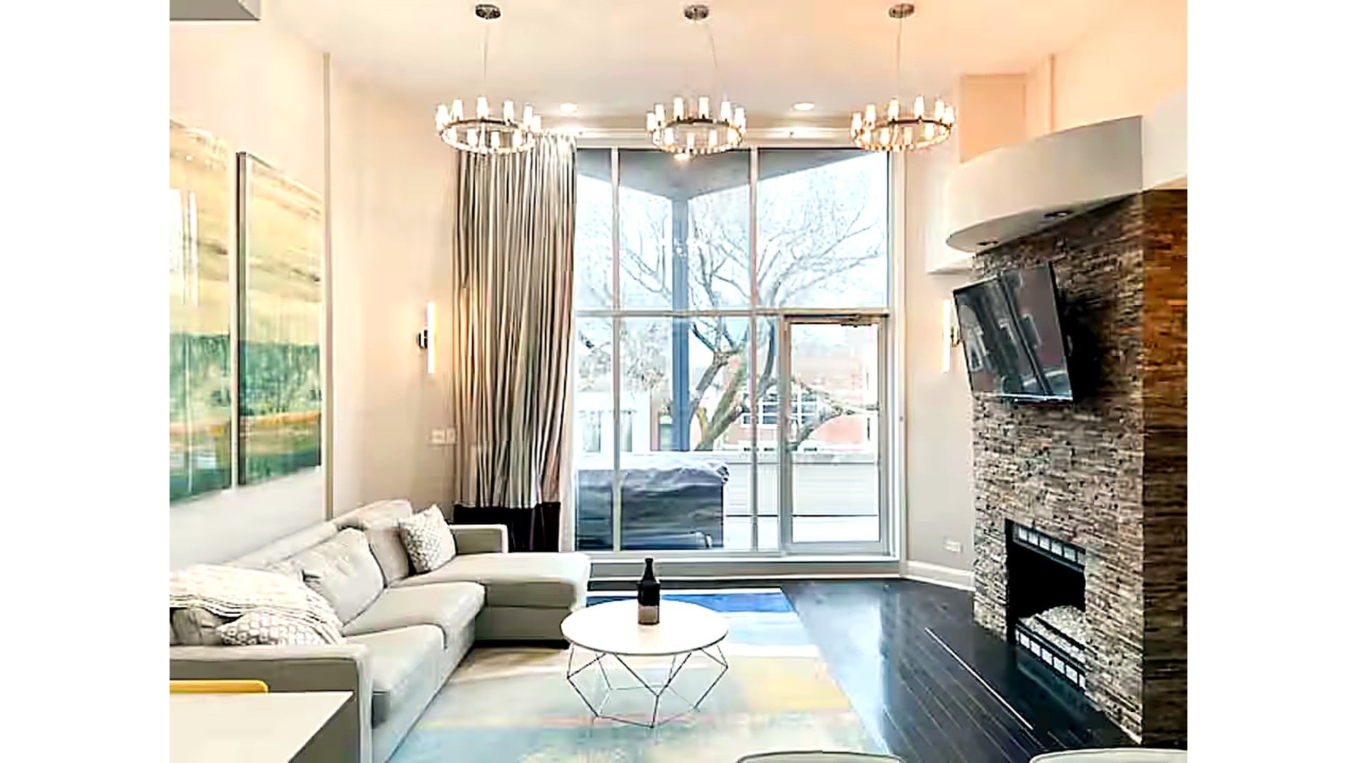 1427 North Mohawk Street Chicago, IL 60610 - Photo 21 of 54 a living room with fireplace furniture and a floor to ceiling window
