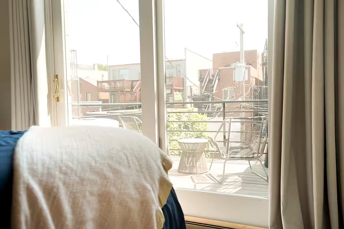 1427 North Mohawk Street Chicago, IL 60610 - Photo 48 of 54 a large white bed with a large window