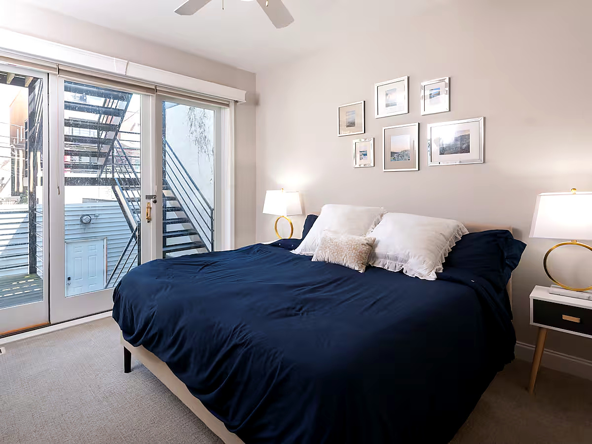 1427 North Mohawk Street Chicago, IL 60610 - Photo 9 of 54 a bedroom with a bed next to a window