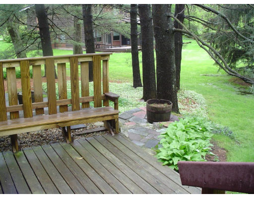 10 Diamond Road Lexington, MA 02420 - Photo 7 of 12 a view of a two chairs in the deck