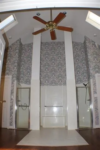 a bathroom with a sink and a large mirror