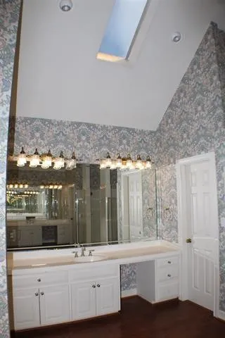a bathroom with a shower and a toilet
