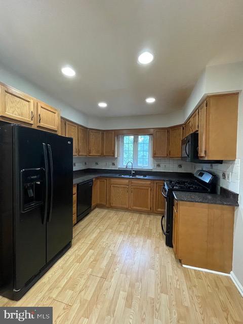 93 Castleton Road Princeton, NJ 08540 - Photo 6 of 25 a kitchen with stainless steel appliances granite countertop a refrigerator and a sink