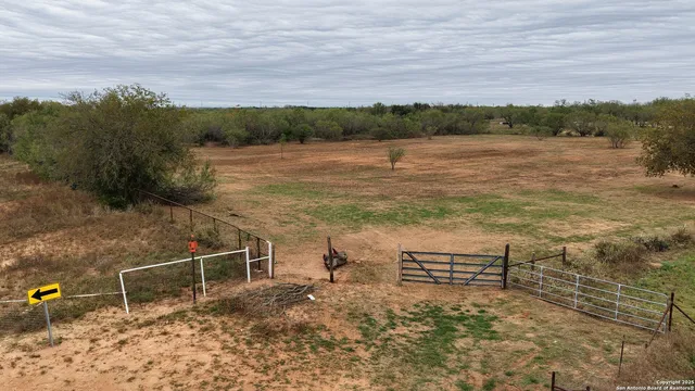 a view of a lake with a yard