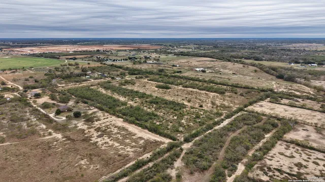 an aerial view of mountain with beach
