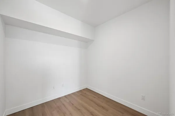 a view of small space with wooden floor