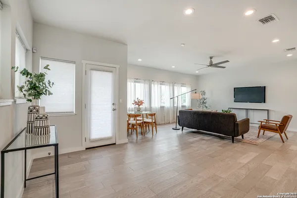 a living room with furniture and a table