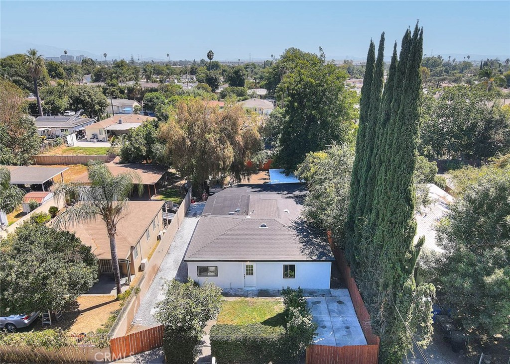 an aerial view of a house with a garden