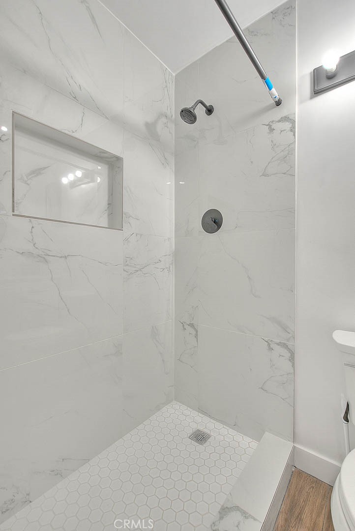 2112 California Duarte, CA 91010 - Photo 34 of 71 a bathroom with a shower and a toilet