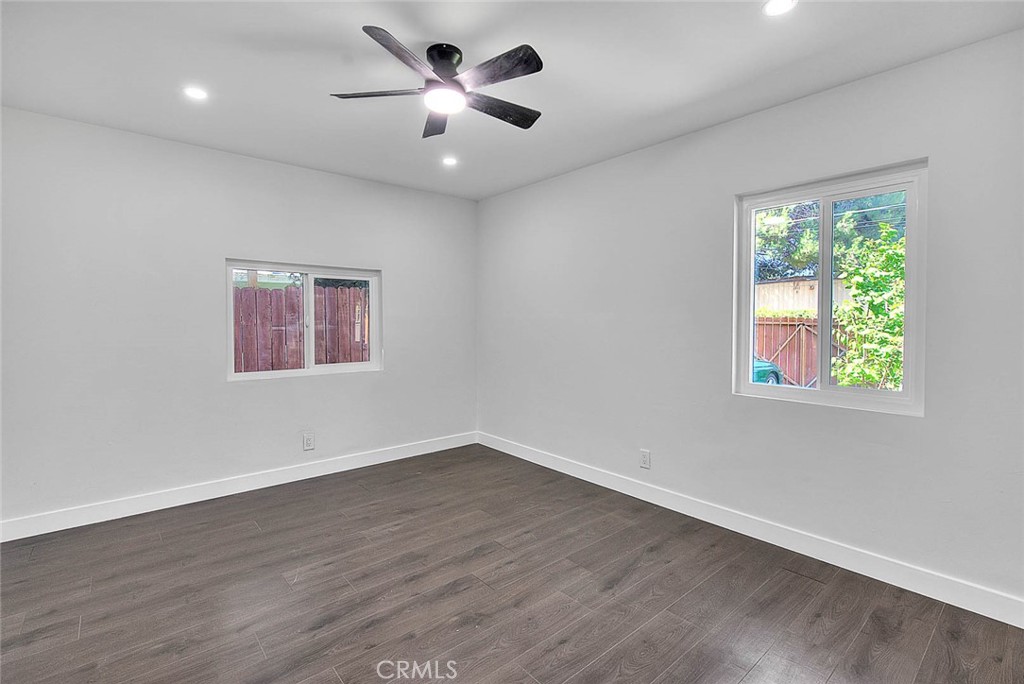 2112 California Duarte, CA 91010 - Photo 38 of 71 a view of an empty room with a window and wooden floor