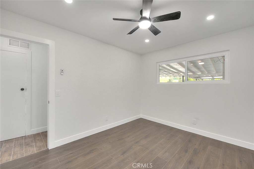 2112 California Duarte, CA 91010 - Photo 46 of 71 an empty room with wooden floor and windows