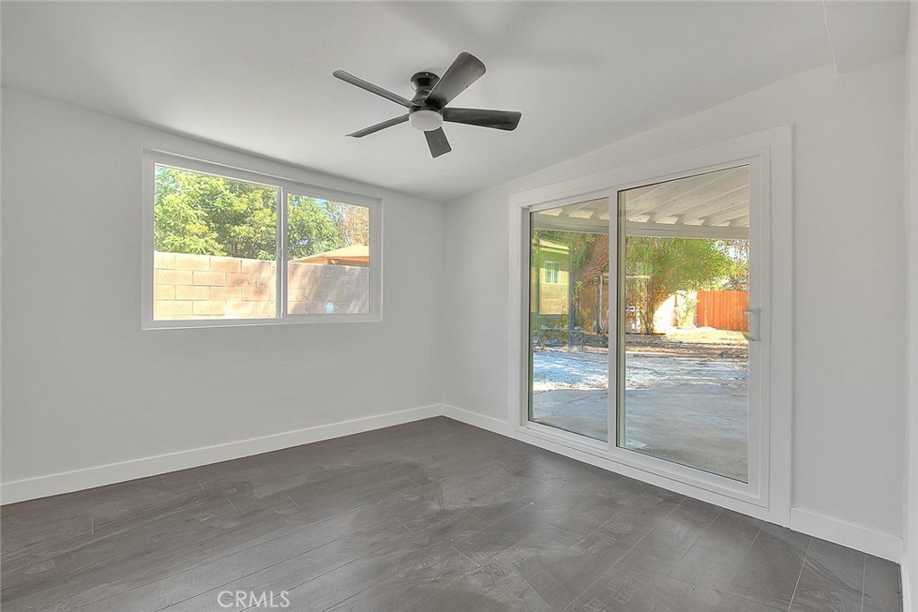 2112 California Duarte, CA 91010 - Photo 51 of 71 an empty room with wooden floor fan and windows