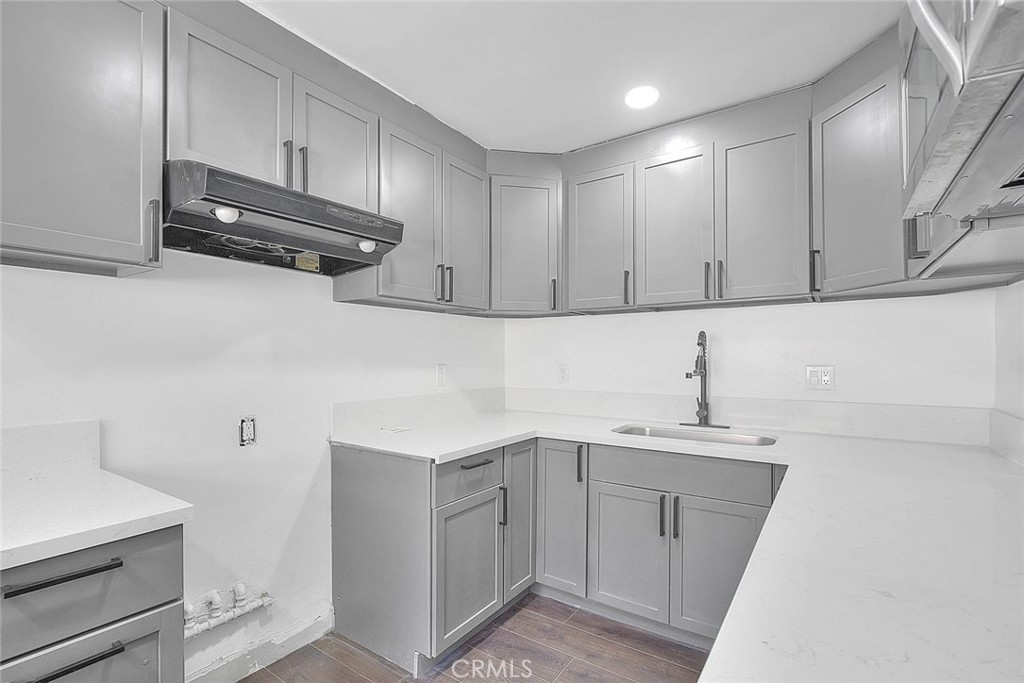 2112 California Duarte, CA 91010 - Photo 57 of 71 a kitchen with a sink cabinets and appliances