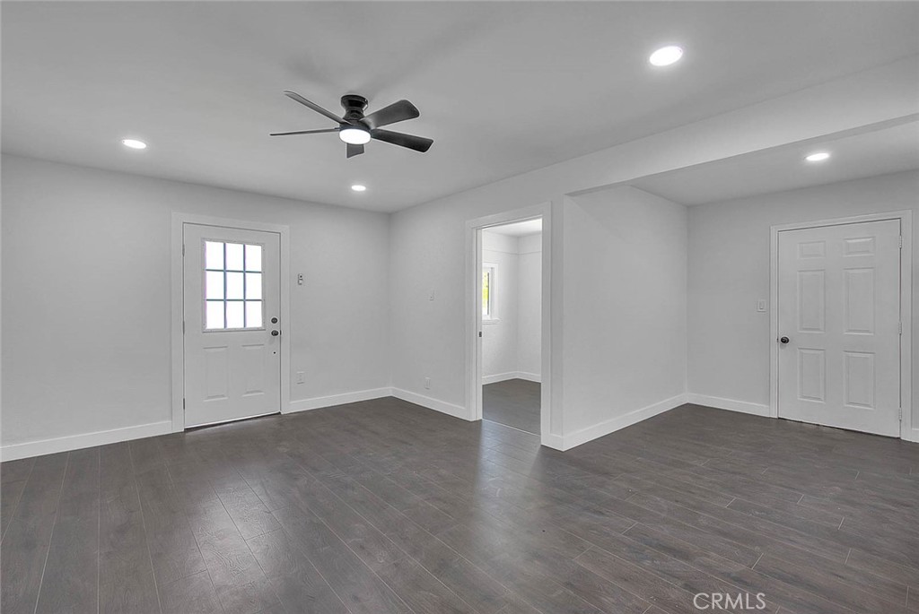 2112 California Duarte, CA 91010 - Photo 64 of 71 a view of an empty room with wooden floor and a ceiling fan
