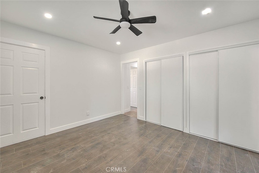 2112 California Duarte, CA 91010 - Photo 69 of 71 wooden floor in an empty room with a ceiling fan