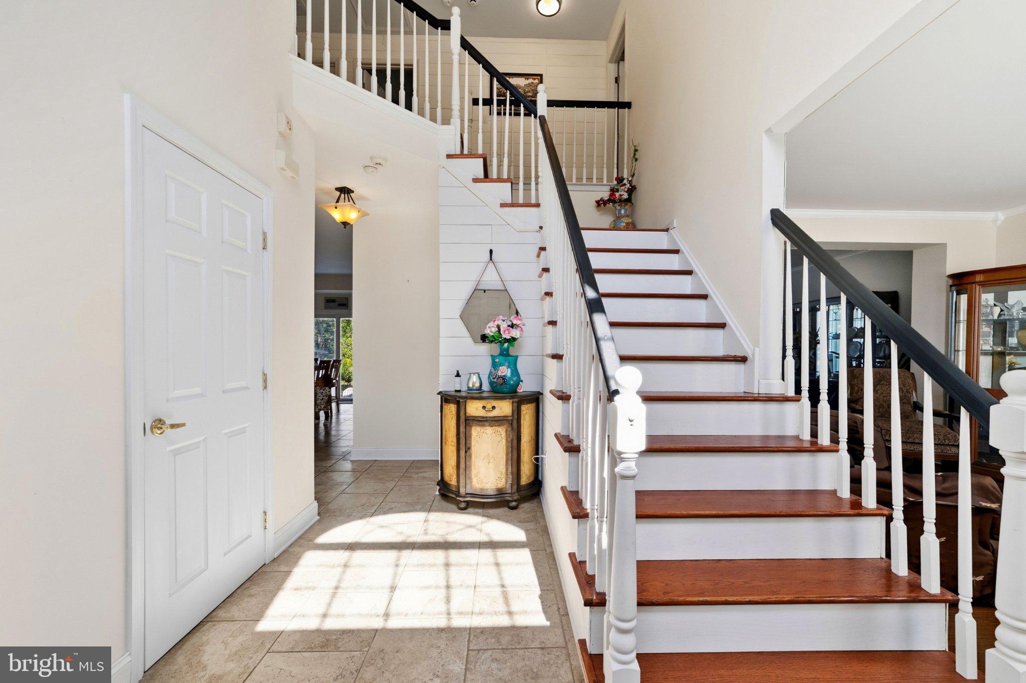 683 South Blue Bell Road Vineland, NJ 08360 - Photo 7 of 38 Inviting foyer with elegant staircase.