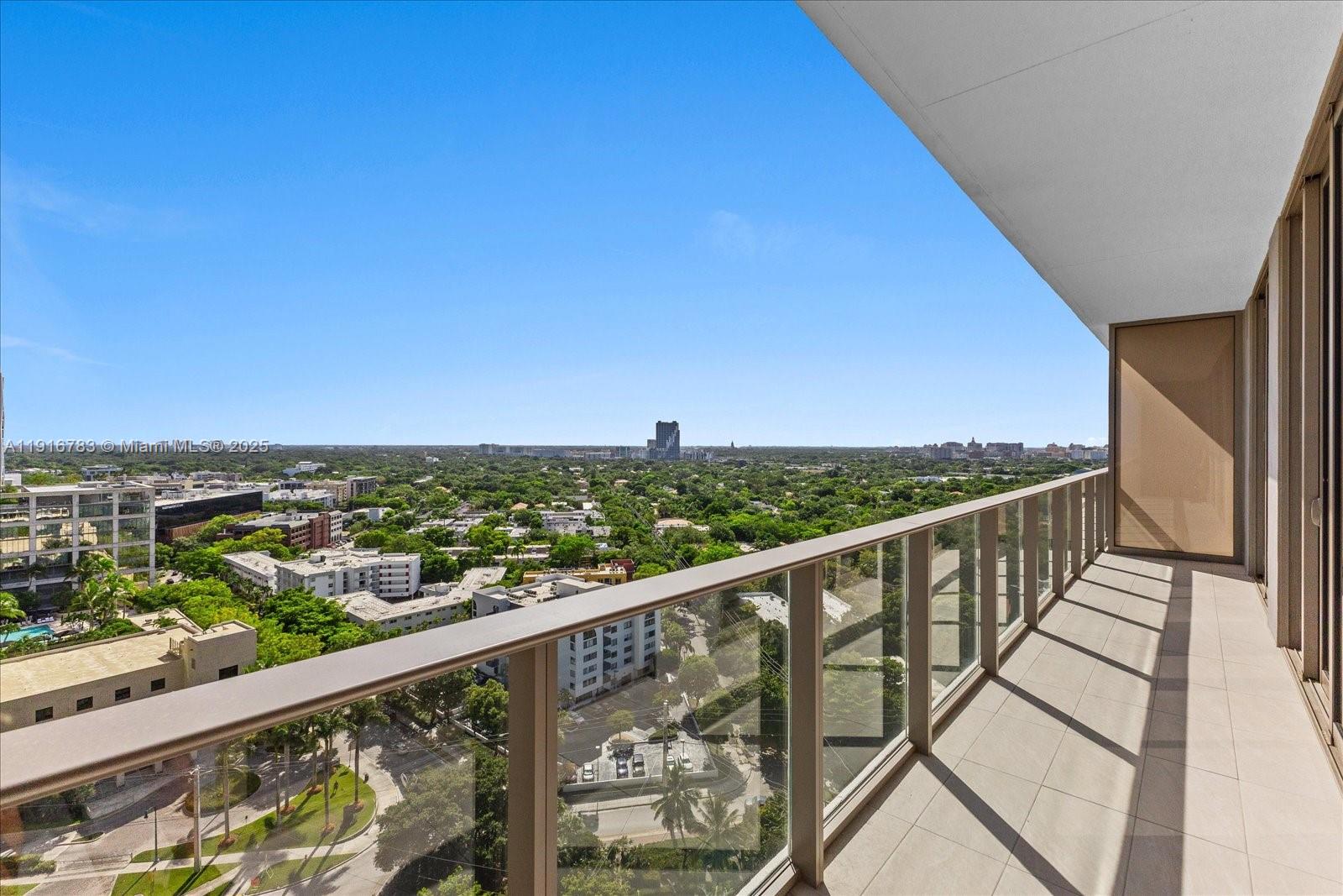 2678 Tigertail Avenue, Unit 1605 Miami, FL 33133 - Photo 3 of 17 a view of city from a balcony