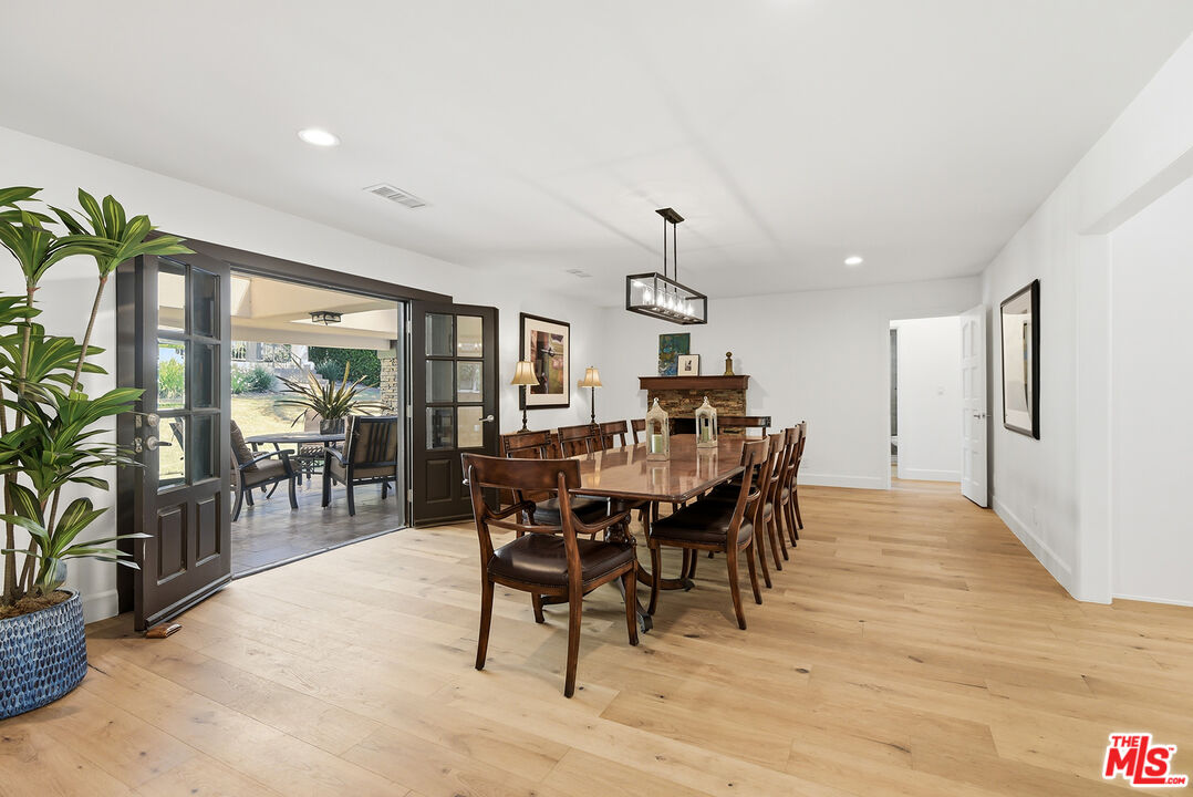 10 Baymare Road Bell Canyon, CA 91307 - Photo 19 of 54 a view of a dining room with furniture window and wooden floor