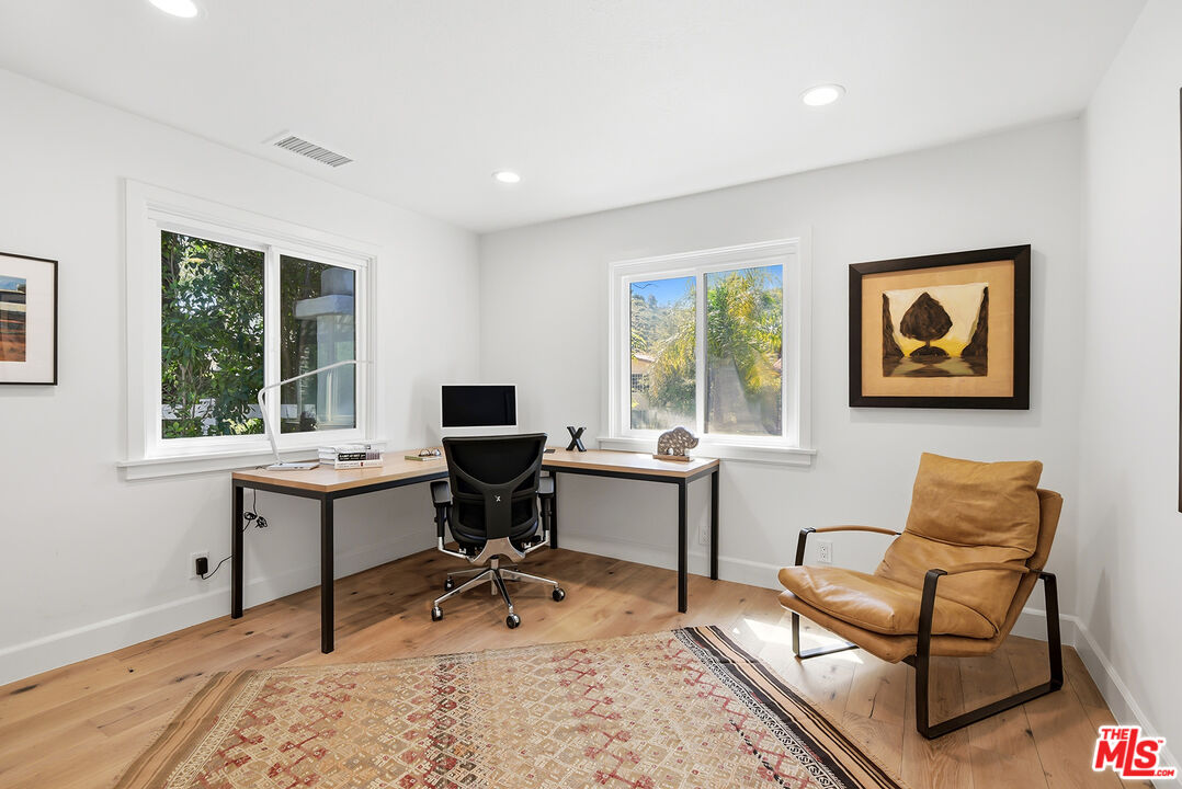 10 Baymare Road Bell Canyon, CA 91307 - Photo 21 of 54 a view of a workspace with furniture and a window