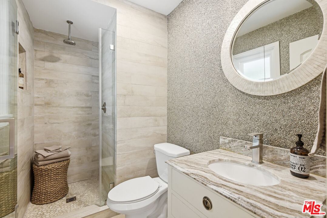 10 Baymare Road Bell Canyon, CA 91307 - Photo 22 of 54 a bathroom with a sink a toilet and shower