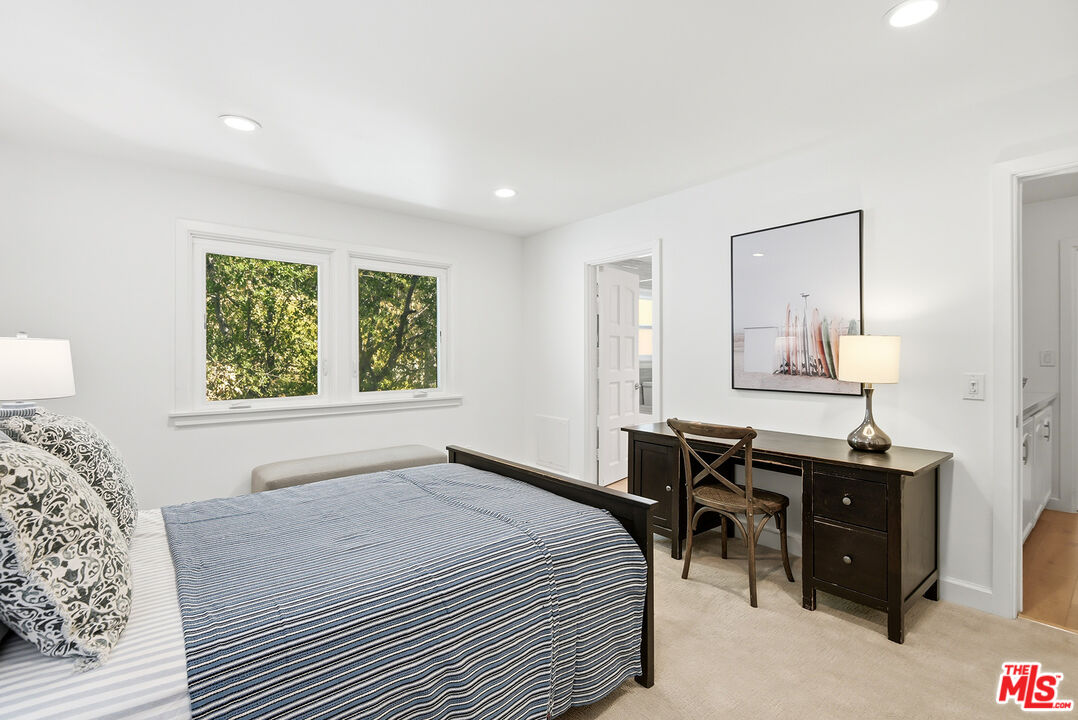 10 Baymare Road Bell Canyon, CA 91307 - Photo 28 of 54 a bedroom with a bed a table and chair