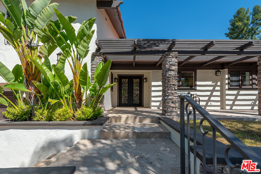10 Baymare Road Bell Canyon, CA 91307 - Photo 3 of 54 a view of a house with potted plants