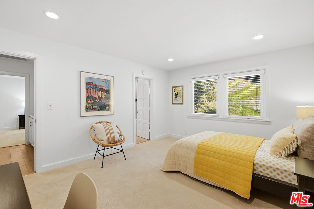 10 Baymare Road Bell Canyon, CA 91307 - Photo 31 of 54 a spacious bedroom with a bed and a window in it