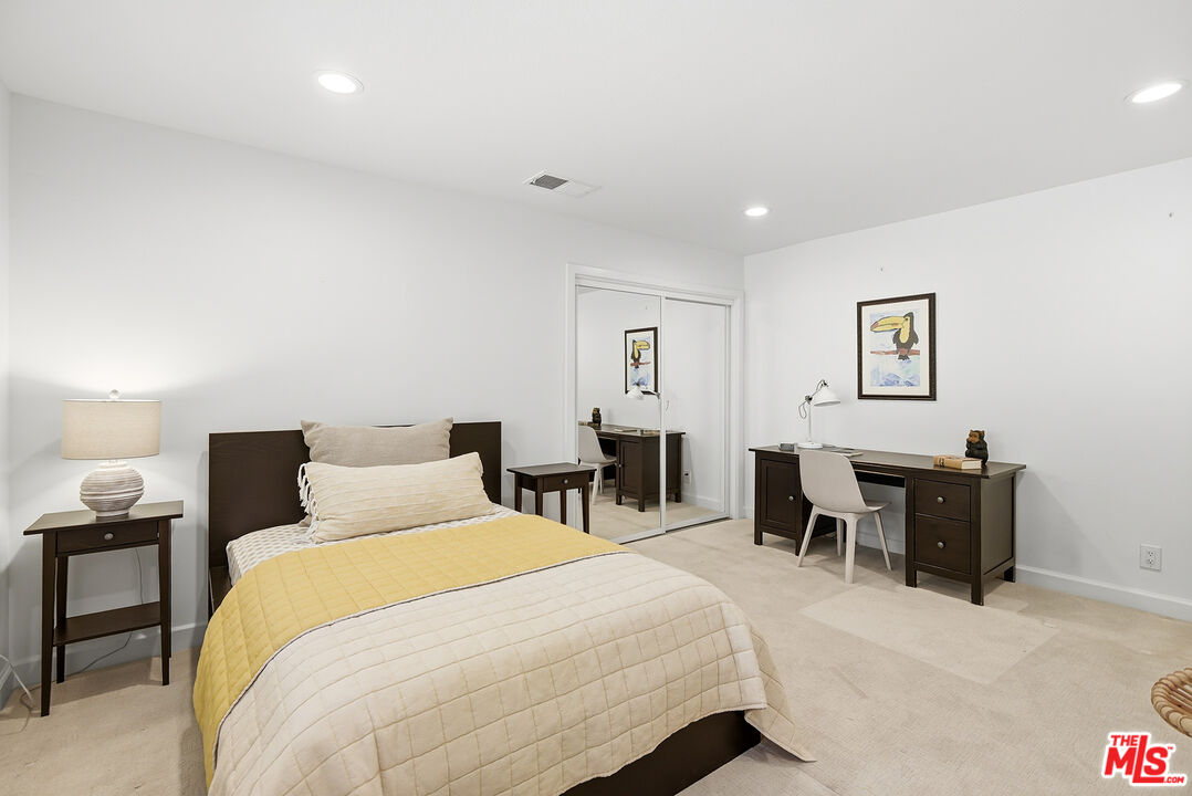 10 Baymare Road Bell Canyon, CA 91307 - Photo 32 of 54 a bedroom with a bed and a table