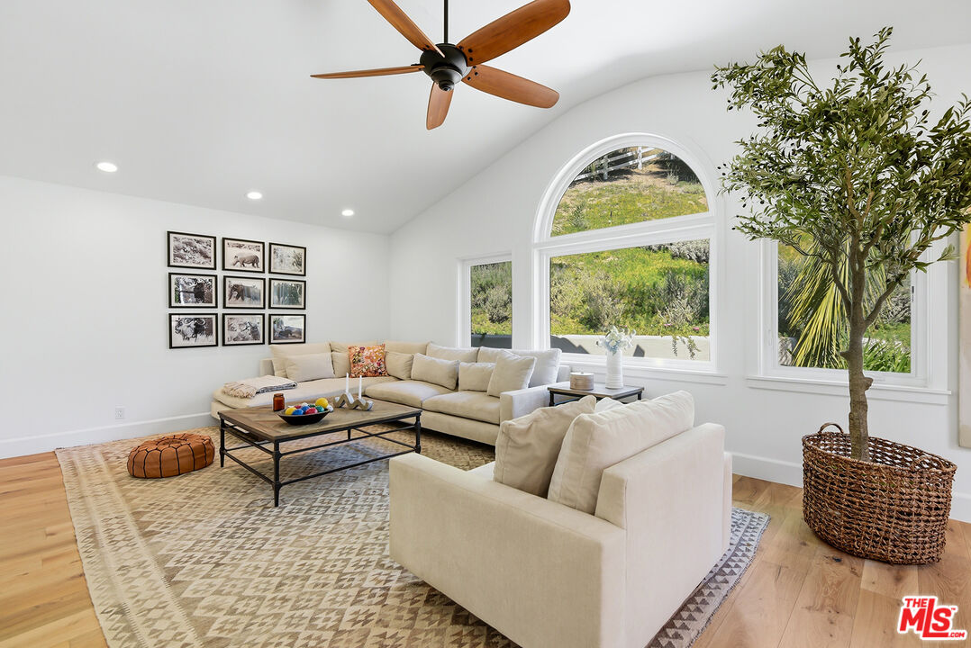 10 Baymare Road Bell Canyon, CA 91307 - Photo 33 of 54 a living room with furniture fireplace and window