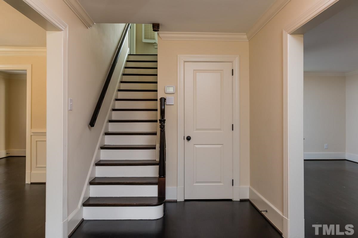 1627 St Marys Street Raleigh, NC 27608 - Photo 3 of 25 a view of entryway with stairs and wooden floor