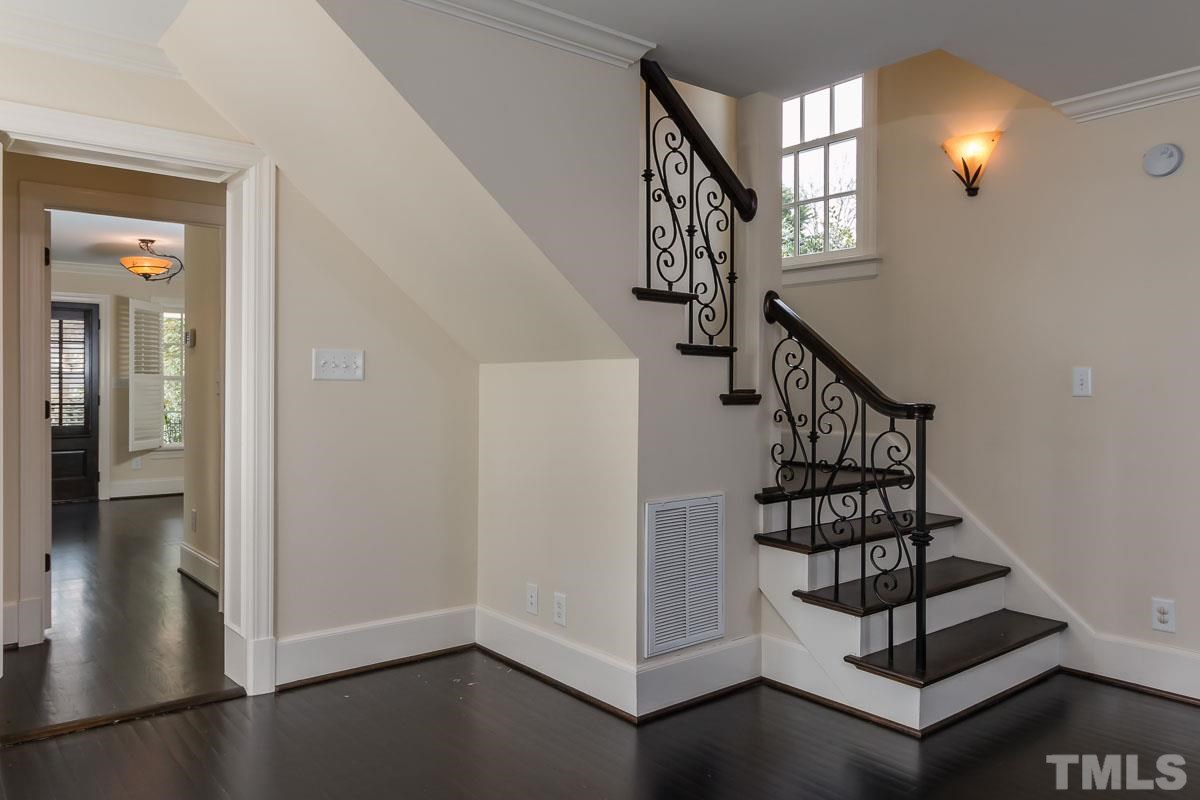 1627 St Marys Street Raleigh, NC 27608 - Photo 8 of 25 a view of entryway and hall with wooden floor