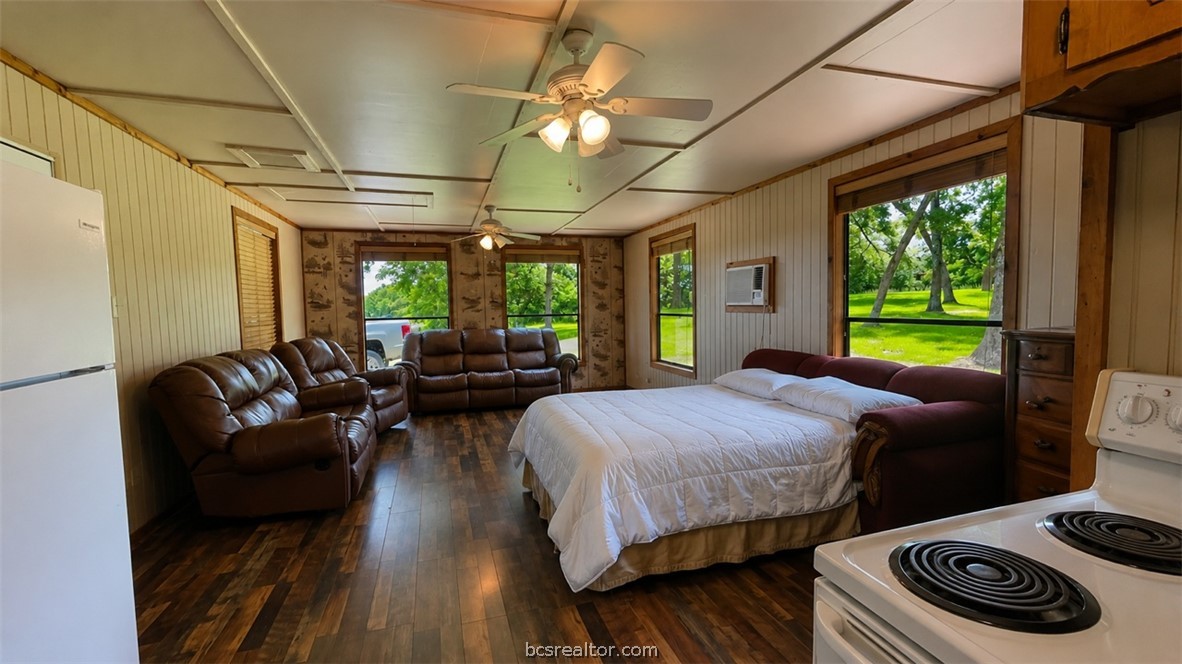 Tbd Tbd Wilson Pasture Road Bryan, TX 77808 - Photo 9 of 29 a bed room with a bed and a couch