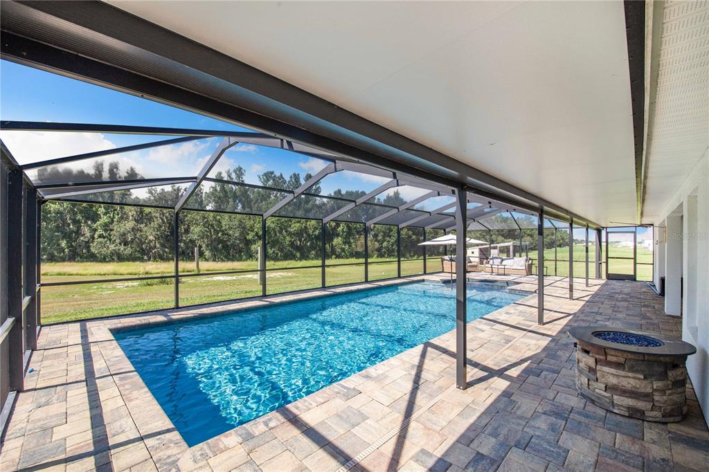 705 Brook Road North Fort Meade, FL 33841 - Photo 23 of 54 a view of swimming pool with an outdoor seating