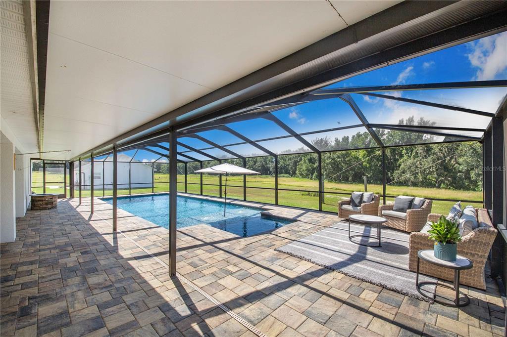 705 Brook Road North Fort Meade, FL 33841 - Photo 27 of 54 a view of swimming pool with a patio