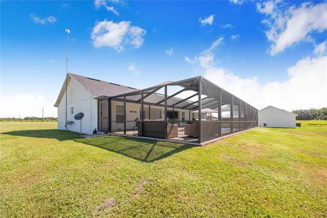 a view of an ocean & house