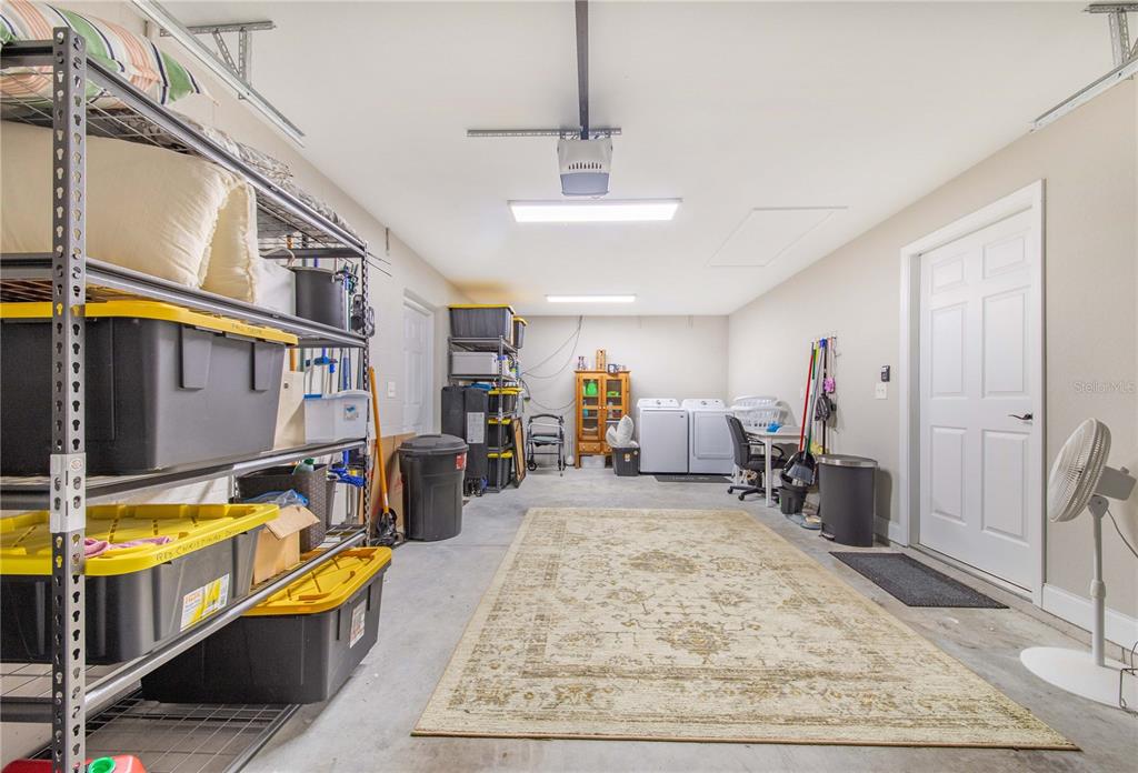 705 Brook Road North Fort Meade, FL 33841 - Photo 38 of 54 a living room with furniture rug and a table