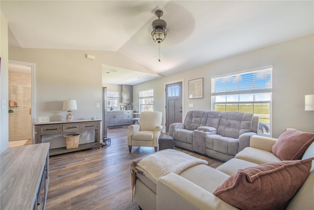 705 Brook Road North Fort Meade, FL 33841 - Photo 39 of 54 a living room with furniture and a window