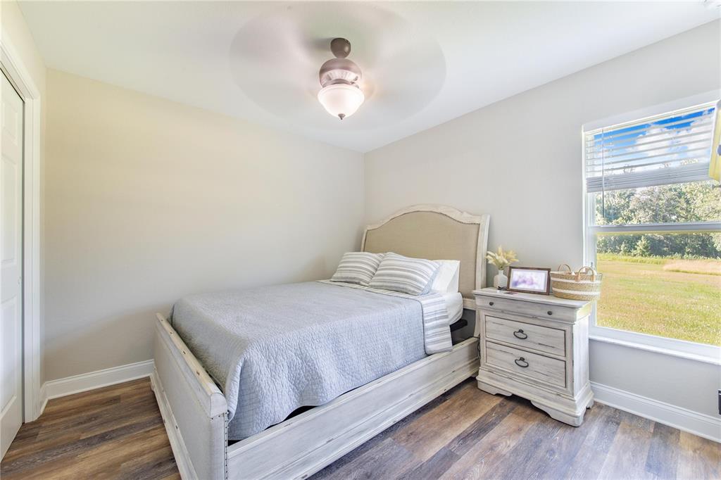 705 Brook Road North Fort Meade, FL 33841 - Photo 41 of 54 a bedroom with a bed and a window